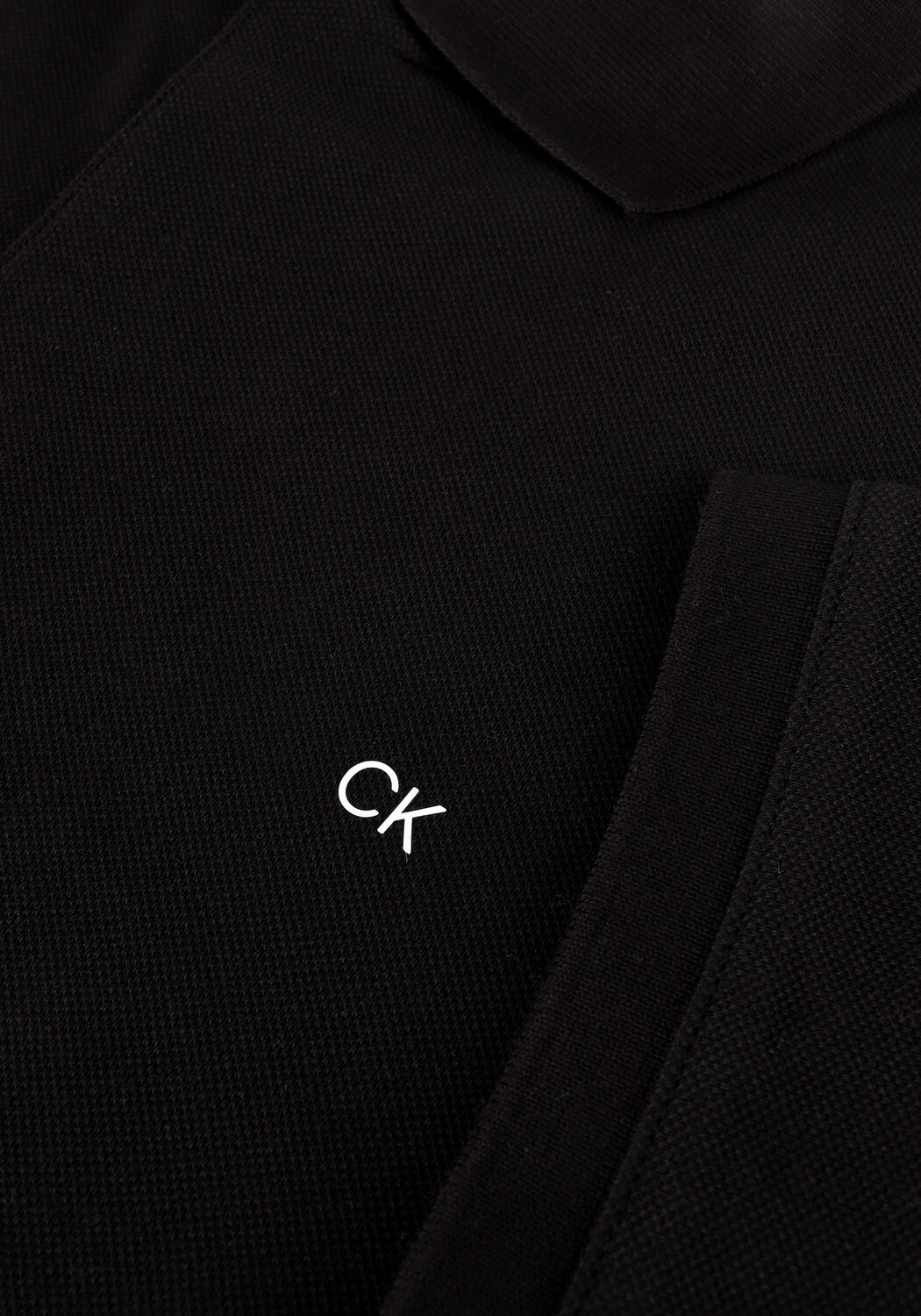 black calvin klein polo